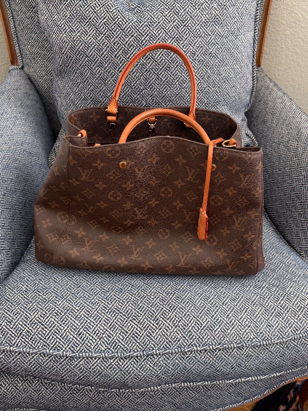 Great brown monogram satchel with fabulous designer detail